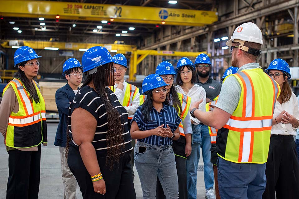 Summer Research Incubator participants touring Alro Steel factory.