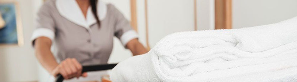 Image of hotel housekeeper